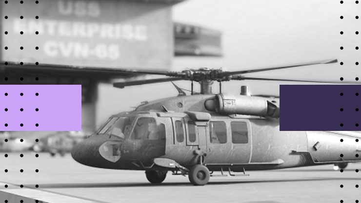 Stylized image of a helicopter on the deck of an aircraft carrier