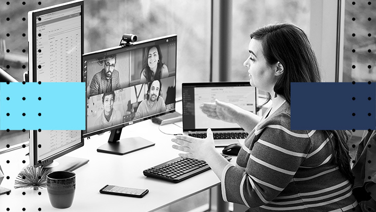 A woman sitting at her desk talking on a video call