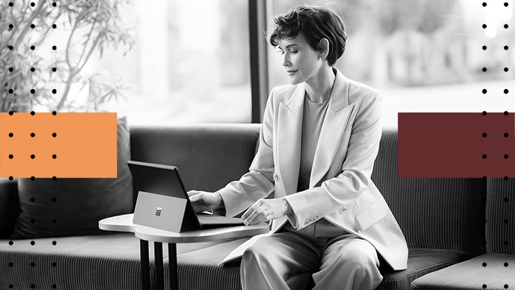 A woman in an office working on a tablet