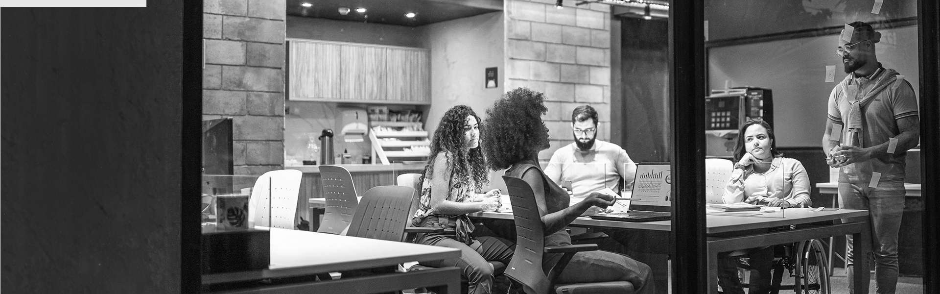 A group of colleagues in a meeting room